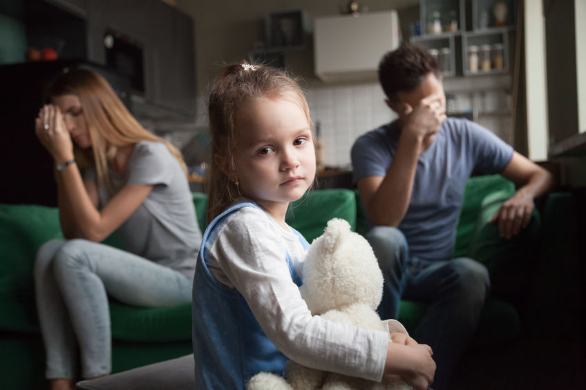 Frustrated girl tired of parents fights, child and divorce conce Frustrated girl