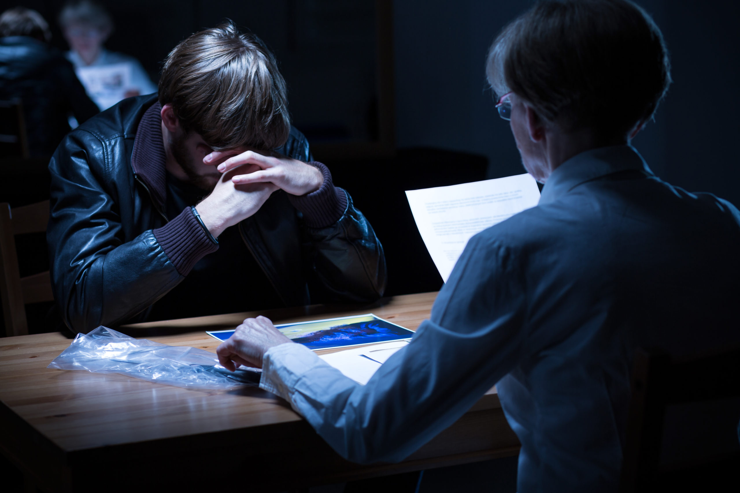 Worried male suspect during hearing Worried male